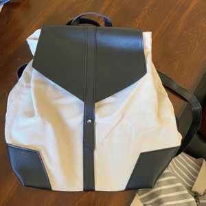 de lux demi backpack